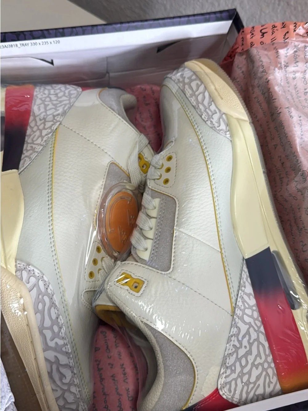 Jordan Men's White Sneakers with Multicolor Heel Accent